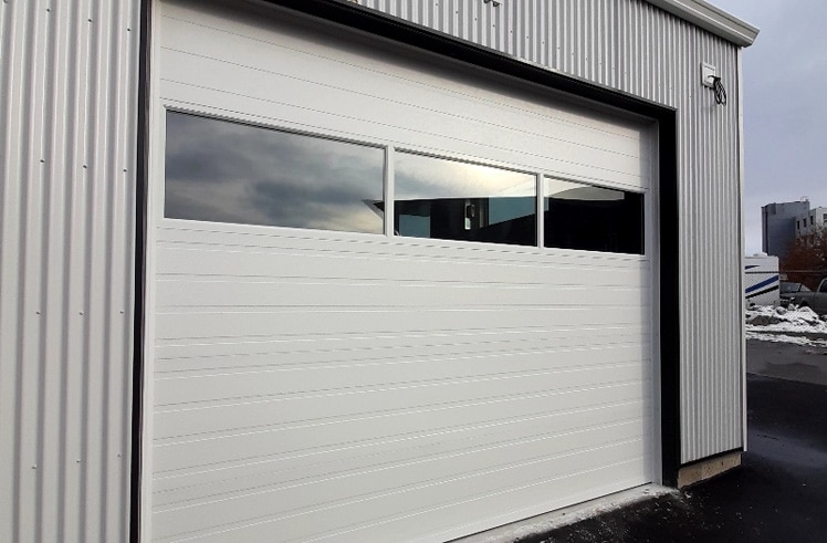 White garage door installed by Legacy Garage Doors