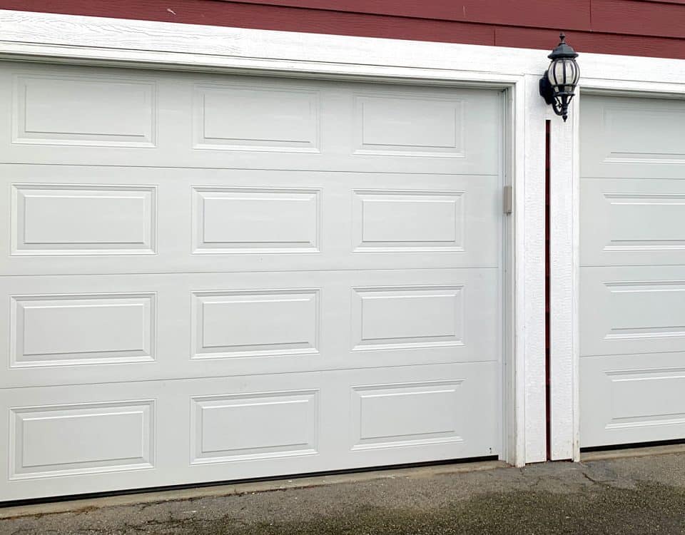 T12 white garage door installed by Legacy Garage Doors