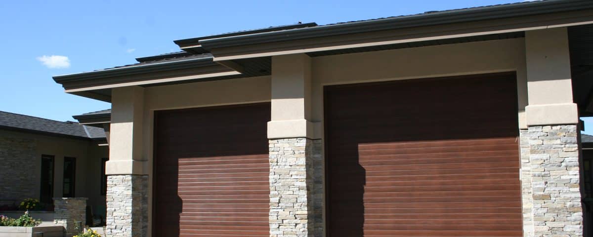 Contemporary walnut garage door installation by Legacy Garage Doors