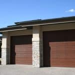 Contemporary walnut garage door installation by Legacy Garage Doors