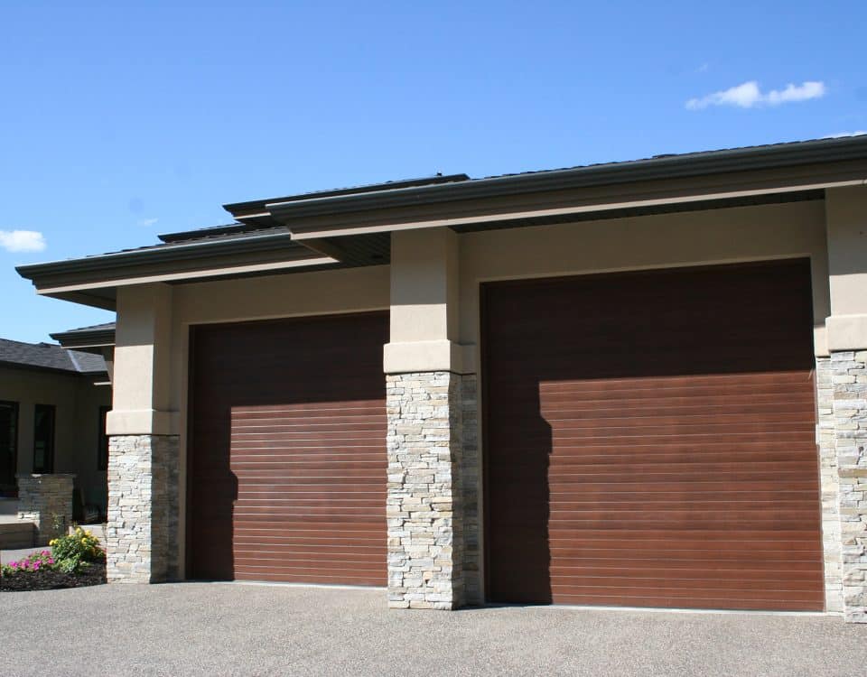 Contemporary walnut garage door installation by Legacy Garage Doors