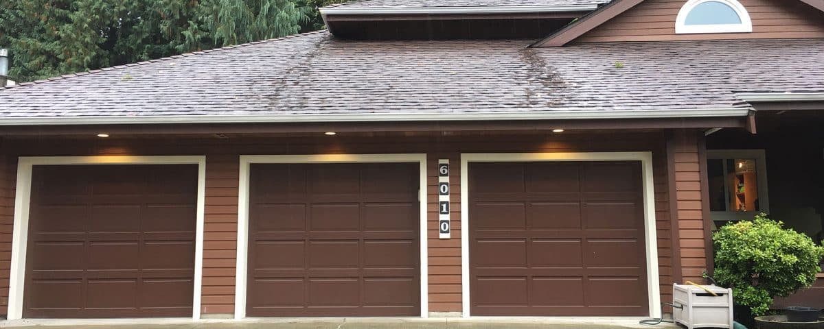 Before view of a contemporary garage door installation by Legacy Garage Doors