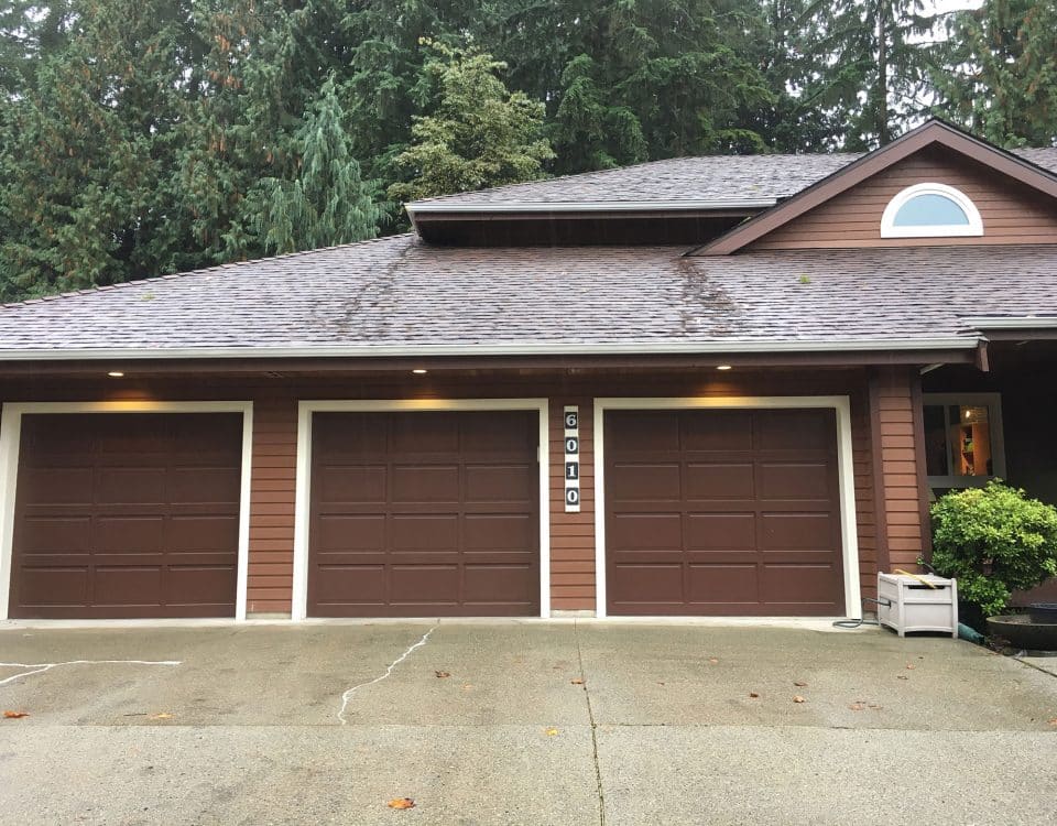 Before view of a contemporary garage door installation by Legacy Garage Doors