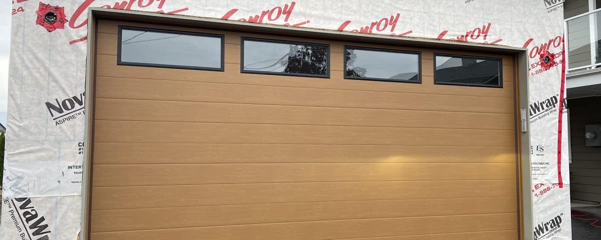 Mid-century modern cedar garage door installed by Legacy Garage Doors