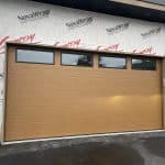 Mid-century modern cedar garage door installed by Legacy Garage Doors