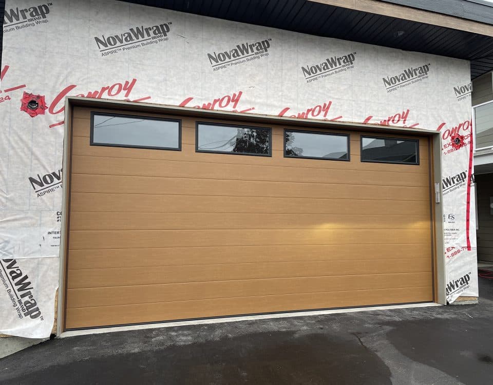 Mid-century modern cedar garage door installed by Legacy Garage Doors