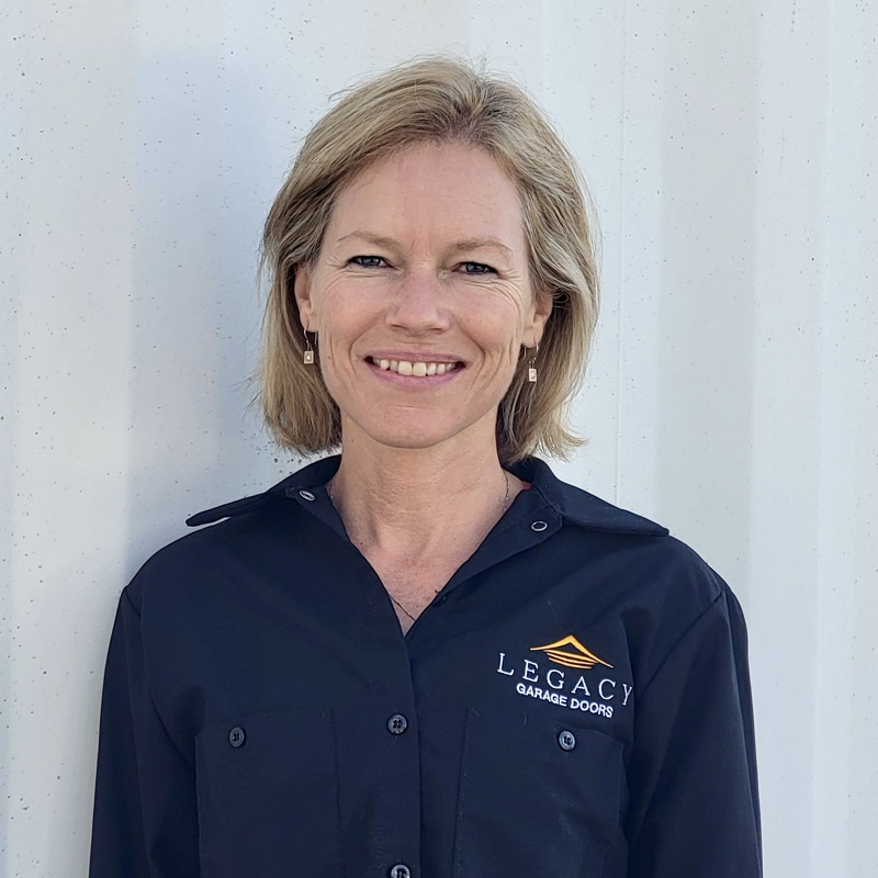 Headshot of Edith with a professional presentation, dressed in company shirt and offering a confident smile