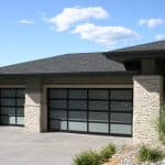 Glass windows in a garage door installed by Legacy Garage Doors