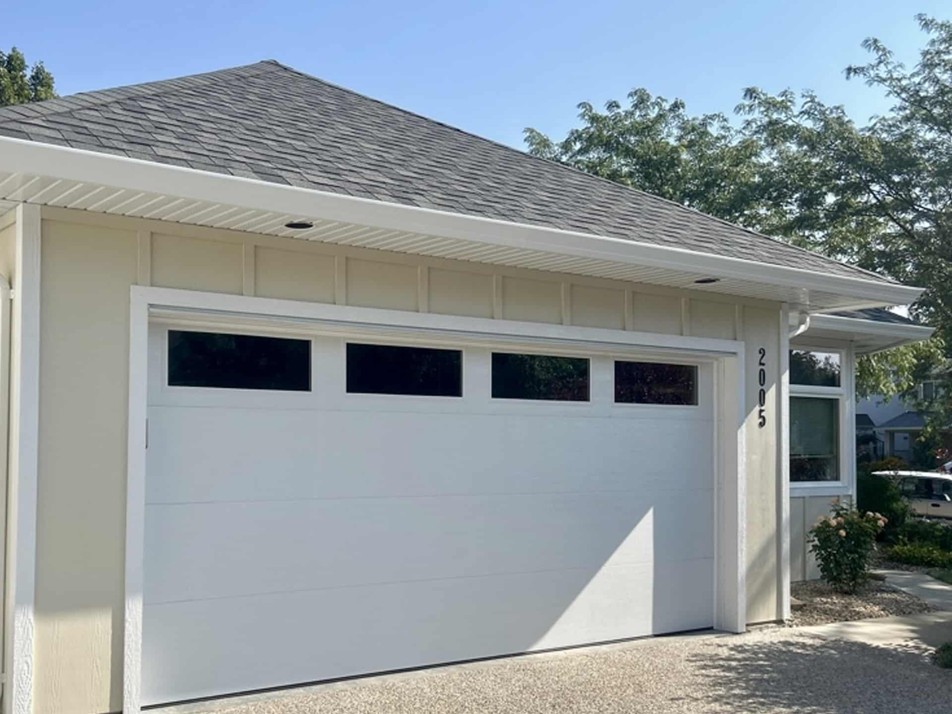 SC After garage door featuring an updated design with a contemporary finish and clean lines