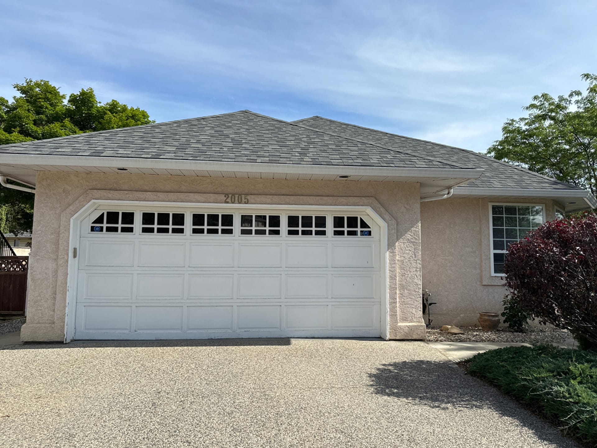 SC Before garage door showcasing the original design with traditional features and a classic finish