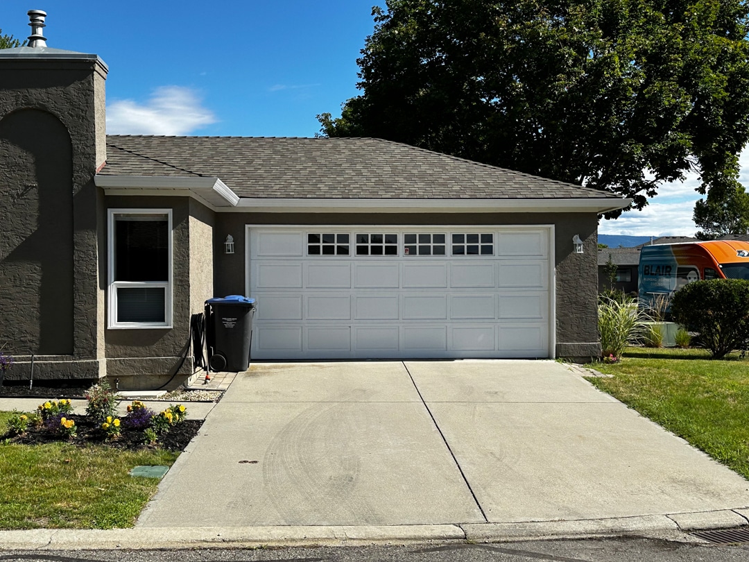 SC Flush Before garage door with a traditional design featuring distinct panels and classic details