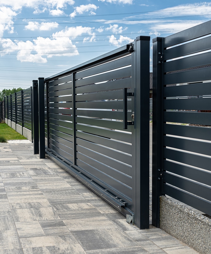 Modern panel fence featuring a sleek and minimalist design, providing a contemporary look for outdoor spaces