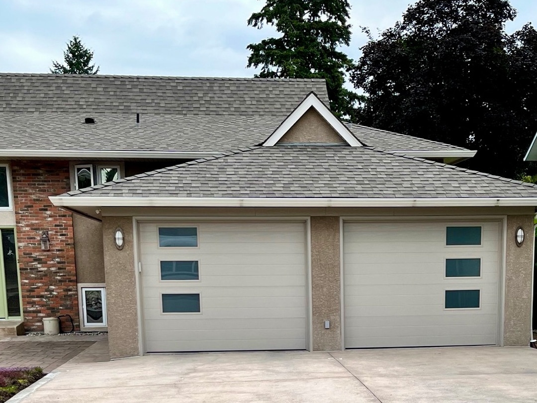 SC Mid-Century Modern Sandstone After garage door with a modernized look featuring a sandblasted texture